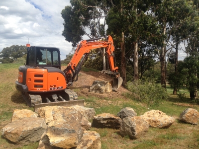 rock garden creation with qualified excavator operator central victoria during